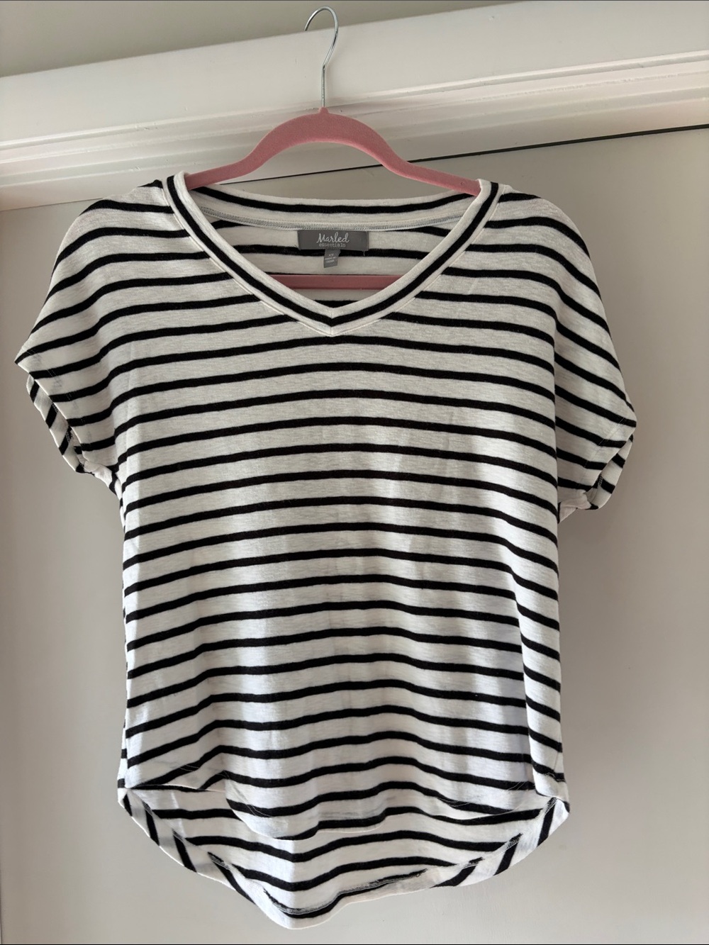 Black and white striped v neck top